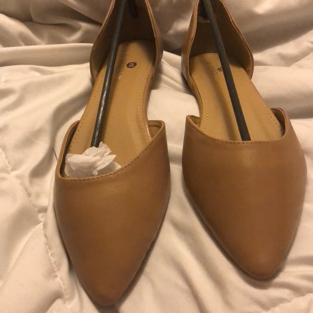 Tan, pointed, flats. Never worn. Size 11.